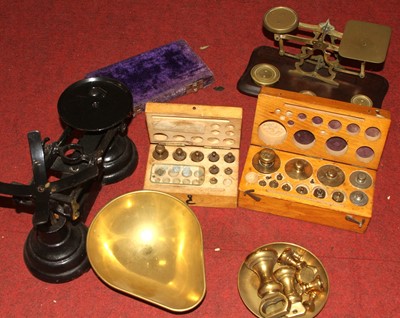 Lot 607 - A set of vintage brass postal scales mounted...