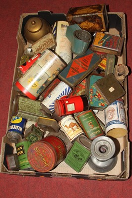 Lot 610 - A collection of vintage tins and moneyboxes to...