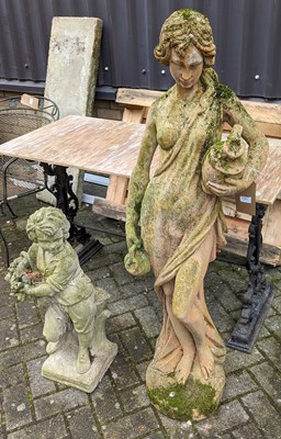 Lot 1383 - A weathered terracotta garden statue of a semi-...