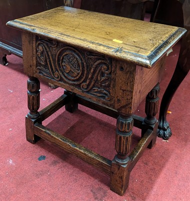 Lot 1375 - A moulded oak needlework box, modelled as an...