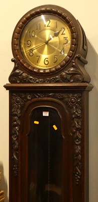 Lot 1189 - An early 20th century oak longcase clock,...