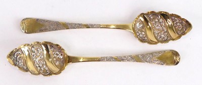 Lot 2159 - A pair of George IV Irish silver gilt berry...