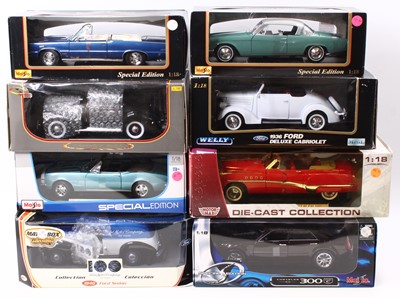 Lot 1074 - Eight boxed 1/18 scale modern issue diecast...