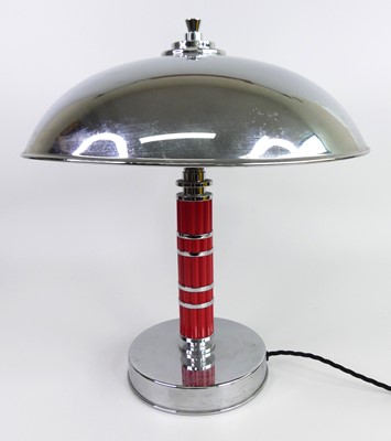 Lot 127 - An Art Deco style chrome and red bakelite...