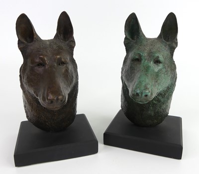 Lot 144 - Michael Button - Dawn, pair of bronze dog bust...