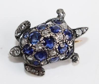 Lot 2210 - A white metal, sapphire and diamond tortoise...