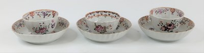 Lot 2097 - Three New Hall porcelain tea bowls and saucers,...