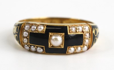 Lot 2200 - A 18ct gold mourning ring, having black enamel...