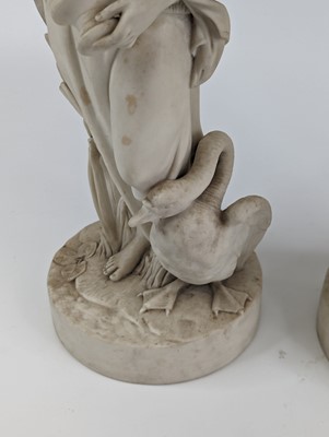 Lot 2115 - A pair of Goss parian figures of ladies, circa...