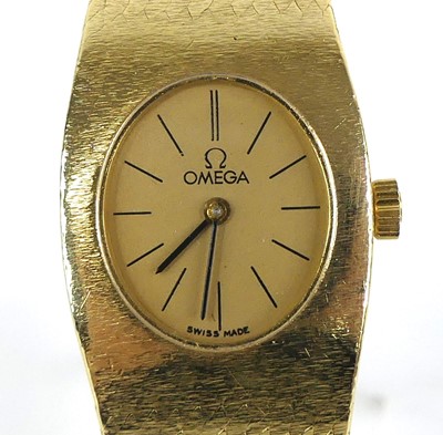 Lot 2318 - A lady's Omega 18ct gold cased bracelet watch,...