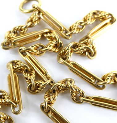 Lot 2275 - An 18ct gold trombone link watch chain, with...