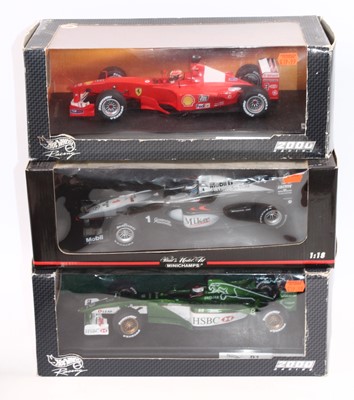 Lot 1009 - A Minichamps and Hotwheels 1/18 scale group of...