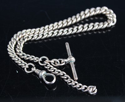 Lot 2276 - A 9ct gold graduated curblink watch chain,...