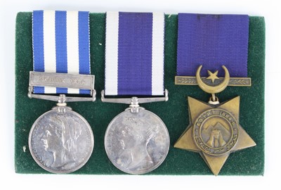 Lot A group of three medals to include Egypt medal...