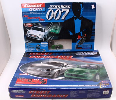 Lot 1827 - Two Scalextric related James Bond 007 boxed...