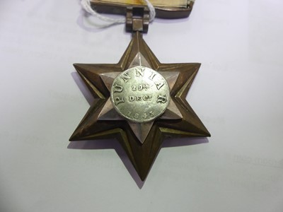 Lot 3033 - A Gwalior Star in bronze, the central silver...