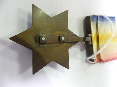 Lot 3033 - A Gwalior Star in bronze, the central silver...