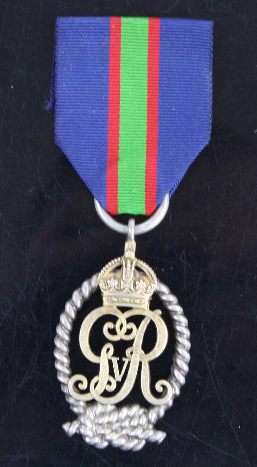 Lot 3037 - A Royal Naval Volunteer Reserve Decoration,...
