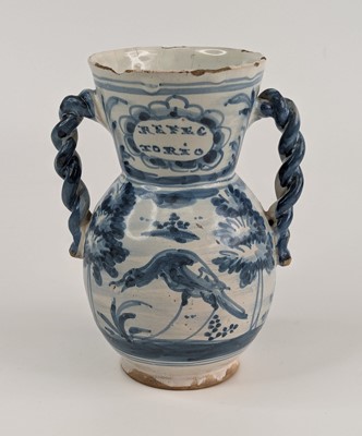 Lot 2067 - A Delft blue and white glazed drinking vessel,...