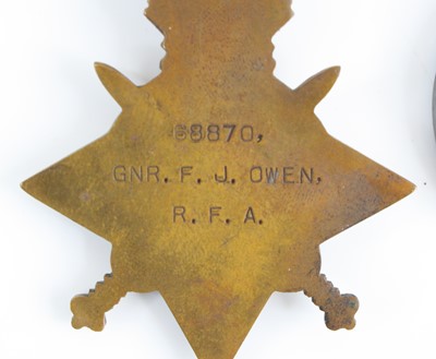 Lot 3052 - A WW I group of three medals to include...
