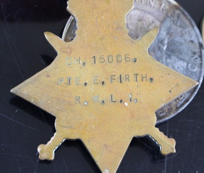 Lot 3061 - A group of four medals to include WW I 1914-15...