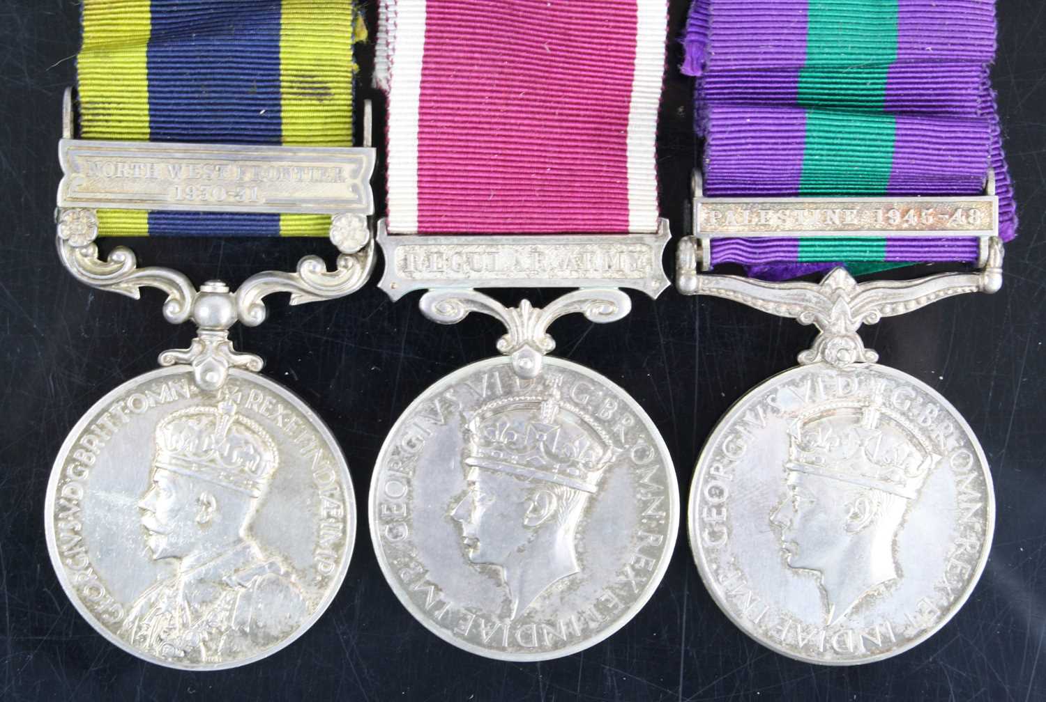 Lot 3063 - A group of three medals to include an India...