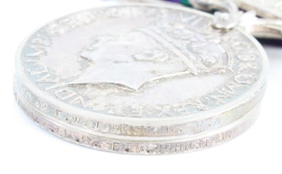 Lot 3063 - A group of three medals to include an India...