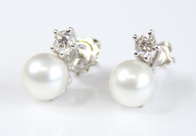 Lot 2217 - A pair of 18ct white gold, pearl and diamond...