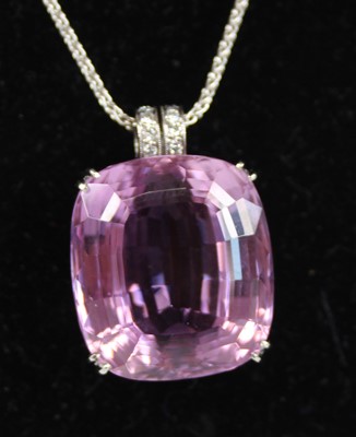 Lot 2242 - A platinum kunzite and diamond pendant,...