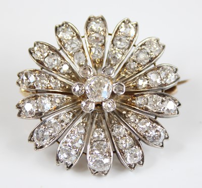 Lot 2207 - A yellow and white metal diamond set daisy...