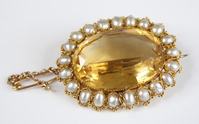 Lot 2205 - A yellow metal, citrine and pearl oval cluster...