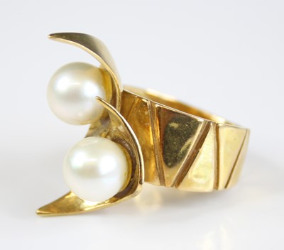 Lot 2216 - An 18ct yellow gold abstract pearl dress...