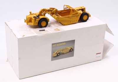 Lot 717 - A Black Rat Models Caterpillar 657 scraper,...