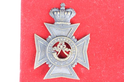 Lot 3095 - A collection of five badges to include 1st...