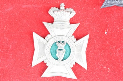 Lot 3095 - A collection of five badges to include 1st...