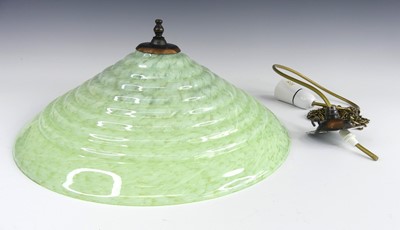 Lot 122 - An Art Deco green mottled glass pendant...