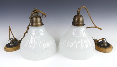 Lot 124 - A pair of holophane pendant celing lights, the...