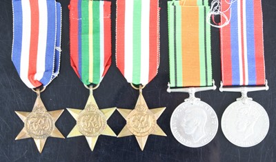 Lot 3295 - A group of five WW II medals to include France...