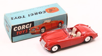 Lot 1179 - Corgi Toys 302, M.G.A sports car in red, mint...