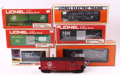 Lot 372 - Plastic crate containing six boxed Lionel...