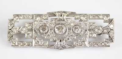 Lot 2202 - An Art Deco platinum and diamond panel brooch,...