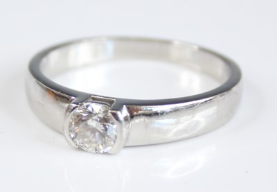 Lot 2263 - A platinum diamond solitaire ring, featuring a...