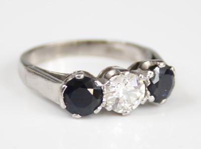 Lot 2248 - An 18ct white gold sapphire and diamond...