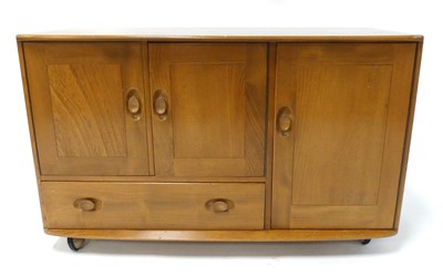 Lot 394 - An Ercol blond elm Windsor 'Model 366'...