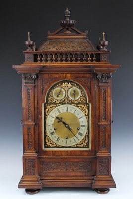 Lot 2445 - A late 19th century walnut cased musical...