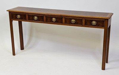 Lot 2479 - A walnut and figured walnut five drawer hall...