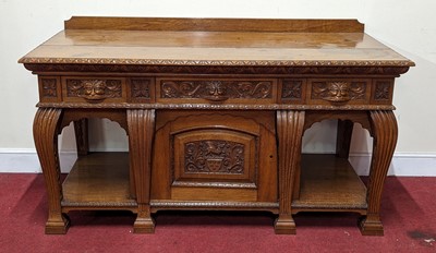 Lot 2468 - A Victorian blond oak sideboard, having a...