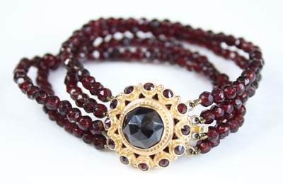 Lot 2233 - A late 19th century Bohemian garnet bracelet,...