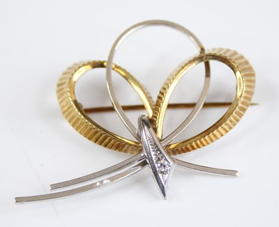 Lot 2204 - A contemporary yellow and white metal ribbon...