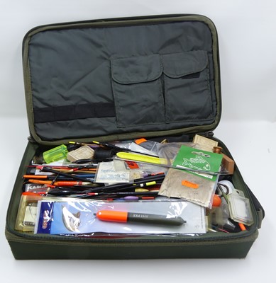 Lot 3515 - A large box of fishing tackle to include a...